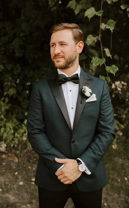 Elegant Michigan Wedding | Kelly & Spencer Green Jacket Groom, Black Tuxedo Green Bowtie, Black And Green Groom, Green Groom Tuxedo, Dark Green Groom, Green Groom, Fall Wedding Attire, Cream Shirt Dress, Wedding Mexican