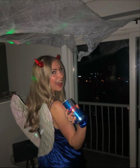 Redbull gives you wings Halloween costume, blue dress with dIY felt cut out logos pinned on with flip on devil horns angles wings shiny blue gloves white cowboy boots and red knee high socks Vodka Redbull Costume, Halloween Costumes Redbull, Redbull Halloween Costume, Red Bull Halloween Costume, Redbull Costume, Red Bull Costume, Bull Costume, Non Basic Halloween Costumes, Cute Halloween Costume Ideas