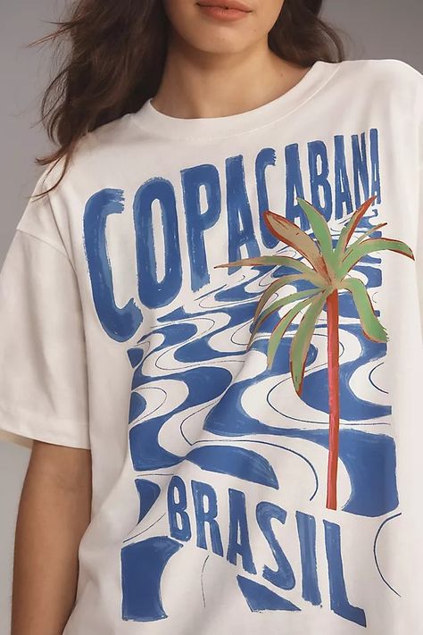 Farm Rio Copacabana Relaxed Graphic Tee | Anthropologie Surf Shirts Graphic Tees, Farm Rio Prints, Festival T Shirt Design, Cool Shirt Designs Graphic Tees, Graphic T Shirt Outfit, Sweat Suits Outfits, Festival Tshirt, Beach Cleanup, Hawaiian T Shirt