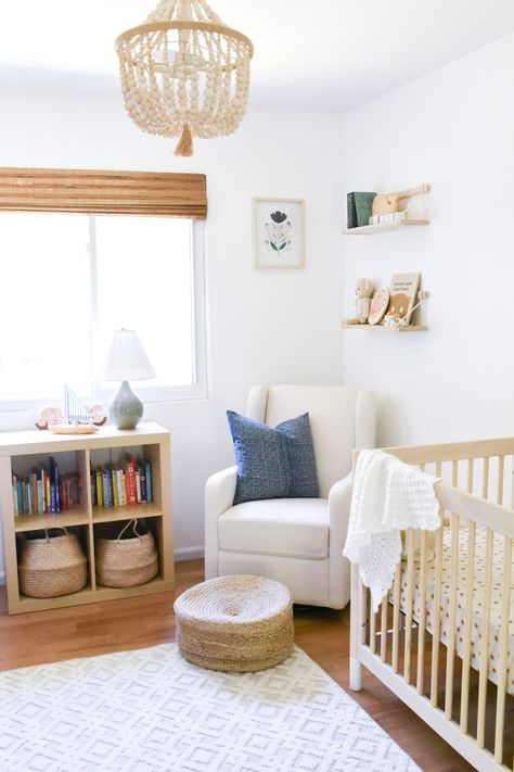 Nursery Nook In Guest Room, Simple Nursery Layout, Nursery Layout With Two Windows, Nursery With Wood Floors, Nursery Furniture Layout Floor Plans, West Elm Nursery, Books In Nursery, Nursery Books, Amber Interiors Nursery