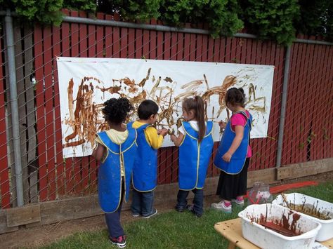 Mud Art: Some KinderCare students celebrating International Mud Day at school. The students painted outside using .... mud. Mud Play Ideas, Mud Art, Outdoor Learning Spaces, Outdoor Play Spaces, Outside Activities, Outdoor Education, Pre Kindergarten, Outdoor Classroom, School Garden