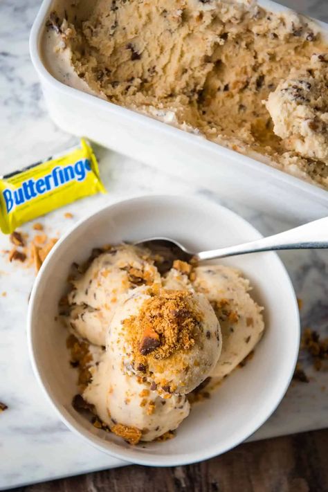 Mix and freeze an easy recipe for homemade butterfinger ice cream that's oh so creamy and rich, full of buttery vanilla flavor, and filled to the gills with crushed chocolate Butterfinger candies. It's a family favorite homemade ice cream recipe. Butterfinger Ice Cream Recipe, Homemade Butterfinger Ice Cream, Butterfinger Ice Cream, Homemade Ice Cream Recipes Machine, Homemade Ice Cream Recipe, Ice Cream Taco, Homemade Peach Ice Cream, Ice Cream Recipes Machine, Mint Oreo