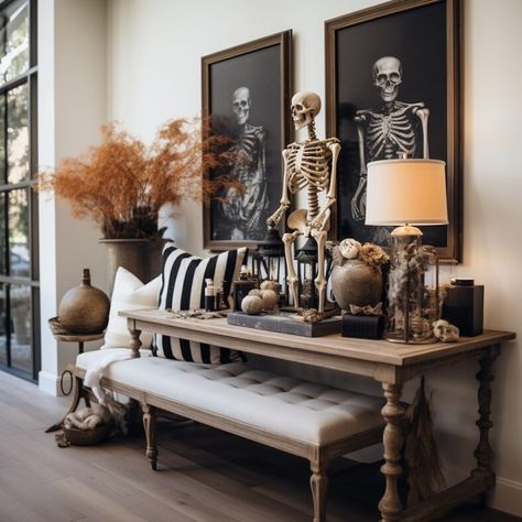 Halloween indoor decor styling - how to create a stylish entryway table with spooky foyer home decorations Spooky Coffee Table Decor, 2024 Halloween Decor, Halloween Atheistic, Halloween Home Decor Indoor, Spooky Dooky, Halloween Entry Table, Indoor Halloween Decor, Halloween Entryway, Modern Halloween Decor