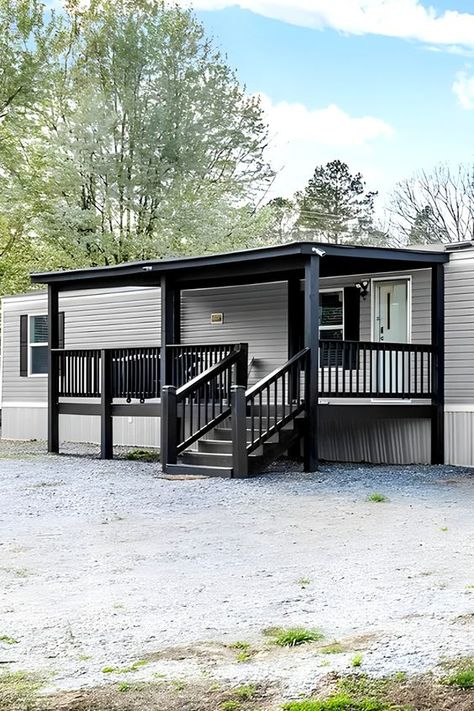 Mobile Home Charcoal Black Porch - Get inspired with these 10 vibrant and stylish color ideas for your mobile home porch! From bold blues to warm yellows, these colors will make your porch the envy of the neighborhood. Add some curb appeal and personality to your home! Trailer Home Porch Ideas, Front Porch Ideas Trailer, Front Porch Trailer Home, Grey And Black Mobile Home Exterior, White Manufactured Home Exterior, Front Porch Diy Makeover, Cute Manufactured Homes, Trailer House Porch Ideas Single Wide, White And Black Mobile Home Exterior