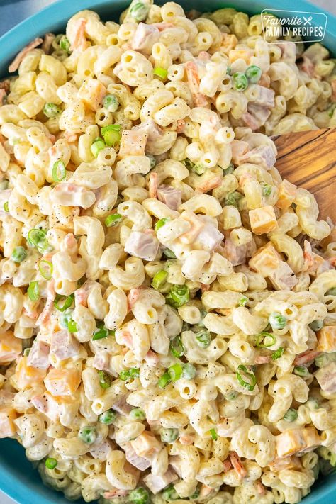 This is the perfect Traditional Macaroni Salad. It's loaded with ham, cheese, and veggies, in a creamy dressing. Perfect for BBQs and Potlucks! #macaronisalad #pastasaladrecipe #macsalad #macaronisaladrecipe #pastasalad #creamydressing #potluckrecipe #bbqrecipe #bbqsalad #summersalad Ham And Cheese Salad Recipe, Loaded Macaroni Salad, Macaroni Ham Salad Recipe, Ham Pasta Salad Recipes Cold, Ham And Cheese Macaroni Salad, Traditional Macaroni Salad Recipe, Macaroni And Ham Salad, Traditional Macaroni Salad, Dressing For Macaroni Salad