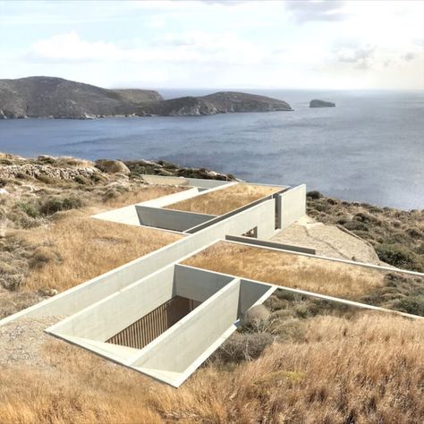 The project is situated on a slope in the southern part of the island of Serifos. Striking rock formations, low vegetation and unobstructed views to the sea characterise this amphitheatrical plot

#architecture #architect #amazingarchitecture #design #interiordesign #interiordesigner #decor #homedecor #home #house #luxury #diy #travel #amazing #photography #realestate #casa #arquitecto #arquitectura #decoration #greece #pool #greekisland #bathroom #kitchen #bedroom #livingroom Greece Pool, Slope House, Underground Homes, Cliff House, Architecture Design Concept, Island House, House On The Rock, Brutalist Architecture, Architecture Exterior