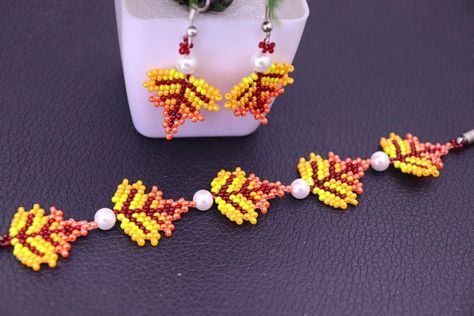 Beaded Bracelet: Step-by-Step Beaded Maple Leaf 🍁 Bracelet Tutorial Adventure! 🌼💎! 💫💫 Tutorial link in BIO👇🏻 Youtube Channel - EASY AND QUICK CRAFT Happy Beading 🙂 #braceletlover #bracelet #bracelets #braceletoftheday #braceletmaking #beadedjewelryinfluencer #beadingtutorial #beaded #beadedjewelry #beadedbracelet #beadedjewelryofinstagram #beadedjewellery #beadedbracelets #beadwork #beadworks #handmadebracelet #handmadejewellery #handmadebracelets #customjewelry #trendyjewelry #fashionjewe... Leaf Bracelet Tutorial, Quick Crafts, Leaf Bracelet, Beading Tutorial, Bracelet Tutorial, Trendy Jewelry, Maple Leaf, Handmade Bracelets, Bracelet Making