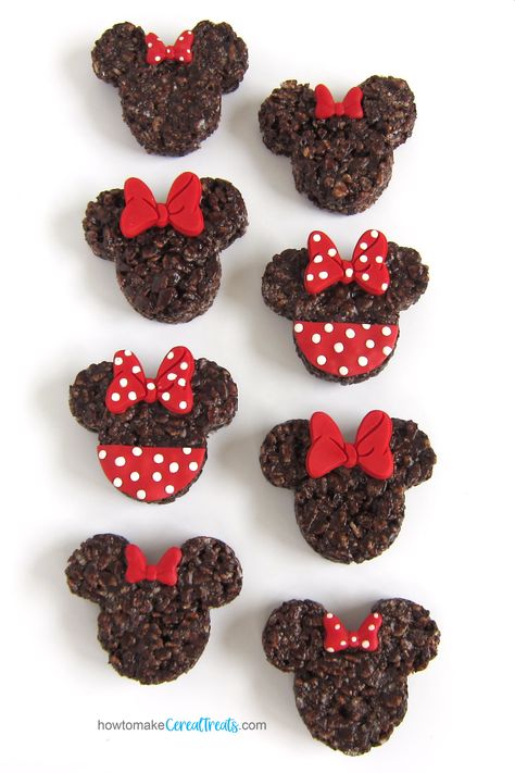 chocolate Minnie Mouse Rice Krispie Treats decorated with red bows Mickey Mouse Krispie Treats, Mickey Rice Krispie Treats, Minnie Mouse Rice Crispy Treats, Disney Rice Krispy Treats, Minnie Mouse Snacks, Rice Krispie Treats Decorated, Mickey Mouse Rice Krispie Treats, Decorated Rice Krispie Treats, Minnie Mouse Treats