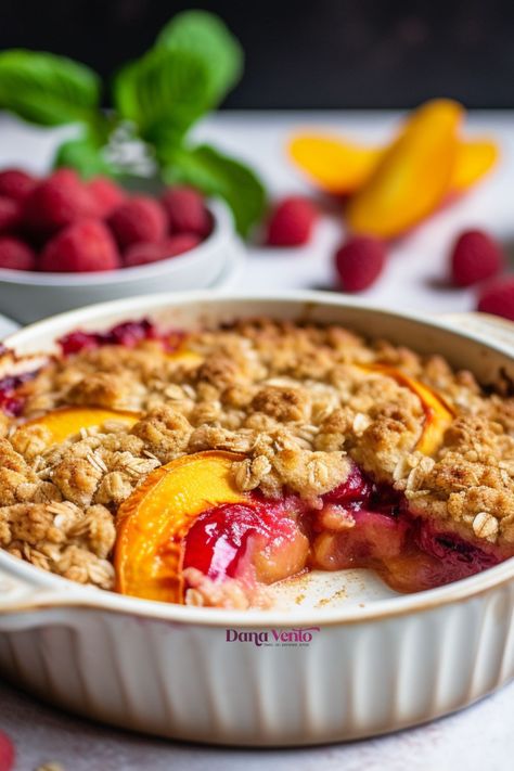 Spiced Peach Melba Cobbler Spoon Peach Melba Cobbler, Peach Melba Dessert, Peach Melba Recipe, Spiced Peaches, Peach Melba, Berry Cobbler, Oat Crumble, Peach Desserts, Food Charlatan