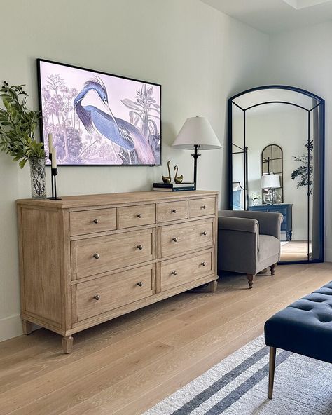 The Smitten Collective | Primary Bedroom Tv In Master Room, Chest Drawer Decor Ideas, Elevated Bedroom, Tv In Bedroom Ideas, Primary Bedroom Decor, Bedroom With Tv, Bedding Styling, Console And Mirror, Bedroom Dresser Styling