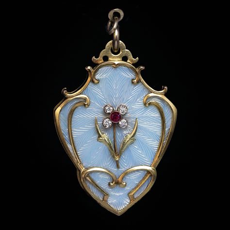 circa 1910 This very large ornate 14K gold locket pendant is designed in Art Nouveau taste of the period. The pendant is embellished with excellent bluish […] Rose Gold Locket, Large Locket, Enamel Locket, Bijoux Art Nouveau, Victorian Locket, Art Nouveau Antiques, Guilloche Enamel, Antique Locket, Vintage Jewellery Rings