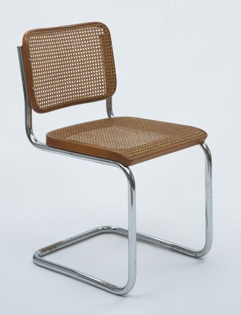 Marcel Breuer. Cesca Side Chair (model B32). 1928. Gebrüder Thonet, Vienna, Austria. Chrome-plated tubular steel, wood, and cane. 32 x 18 x 21 3⁄8 x 18 1⁄8” (81.3 x 45.7 x 54.3 x 46 cm). Purchase. 835.1942. Architecture and Design Marcel Breuer Cesca Chair, Marcel Breuer Chair, Breuer Cesca Chair, Breuer Chair, Iconic Furniture Design, Cesca Chair, Modernist Furniture, Iconic Chairs, Cantilever Chair