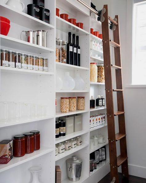 source: Portico Design Group  Perfectly organized pantry with floor to ceiling white built-in shelves with sliding library ladder. Shallow Pantry, Portico Design, Shallow Shelves, Pantry Inspiration, Pantry Decor, Pantry Room, Farmhouse Pantry, Organized Pantry, Library Ladder