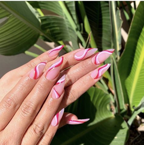 a perfect pop of color to add to a spring day! this pretty and bright 2021 trend of squiggly lines of white, pink and MORE PINK!! 💕💕 a mix between a silhouette and almond nail shape. A nail idea to add fo your next appointment! Squiggly Line Nails, White Lines On Nails, Almond Shaped Nails Designs, Almond Nails Pink, Squiggly Lines, Funky Nail Designs, Classy Acrylic, Line Nail Art, Infinity Nails