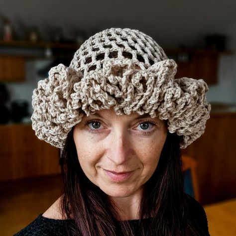 Discover the Grand Ruffle Brim Hat Pattern, a perfect crochet project to make a stylish statement this summer. Crafted with airy treble stitches and a dramatic ruffled brim, this hat pairs elegance with sun protection. Crochet Brim Hat Free Pattern, Crochet Ruffles Pattern, Crochet Ruffle Hat Free Written Pattern, Crochet Ruffle Hat Free Pattern, How To Make Ruffles, Ruffles Pattern, Ruffle Hat, Crochet Hat With Brim, Ravelry Crochet