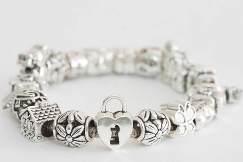 How to Clean a Pandora Bracelet - Our Top Hacks | Cleanipedia UK Cleaning Pandora Jewelry, How To Clean Pandora Bracelet At Home, How To Clean Pandora Jewelry At Home, Cleaning Pandora Bracelet, Pandora Cleaning, Top Hacks, Homemade Jewelry Cleaner, Cleaning Silver, Jewelry Cleaner Diy