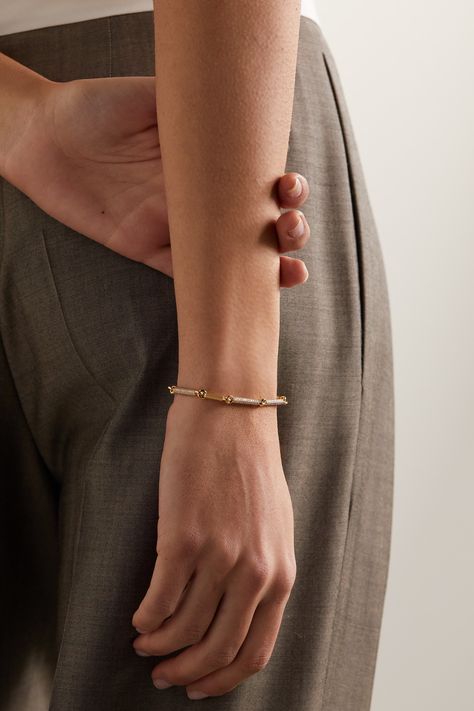 MAOR's 'Orion' bracelet is part of its 'Saturn' collection, which is inspired by the "energy of the constellations." Cast from 18-karat gold, it features structured bar links encrusted with a cluster of sparkling diamonds. Wear it solo or stack it up with other chains. Hand Model Jewelry, Diamond Jewelry Shoot, Hand Model Poses Jewelry, Jewelry Branding Shoot, Jewelry Shoot Ideas At Home, Lifestyle Jewelry Photography, Jewelry Lifestyle Photography, Bracelet Photoshoot Ideas, Jewellery Shoot With Model