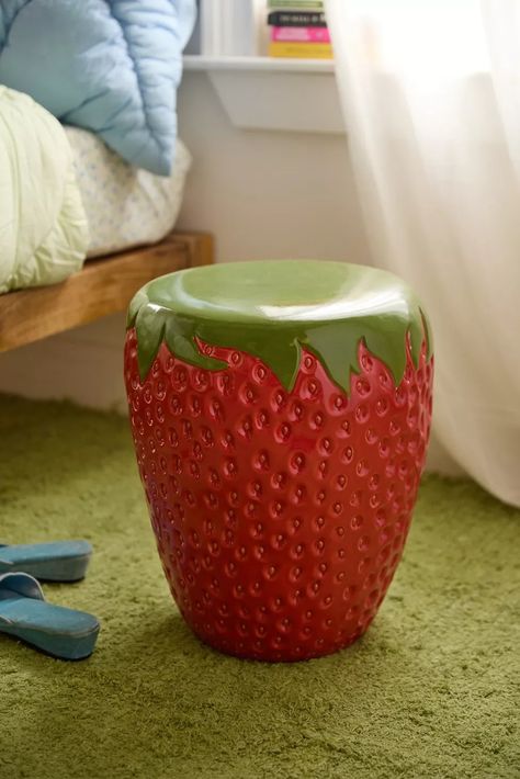 Strawberry Ceramic Side Table | Urban Outfitters Strawberry Living Room Decor, Food Shaped Furniture, Strawberry Stool, Urban Outfitters Bedroom Decor, Fruit Stool, Strawberry Furniture, Bama Dorm, Strawberry Bedroom, Maximalist House