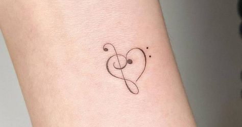 Treble clef Bass And Treble Clef, Clef Tattoo, Treble Clef Heart, Treble Clef Tattoo, International Tattoo, Music Keyboard, Heart Tattoos, Tattoos Gallery, Treble Clef