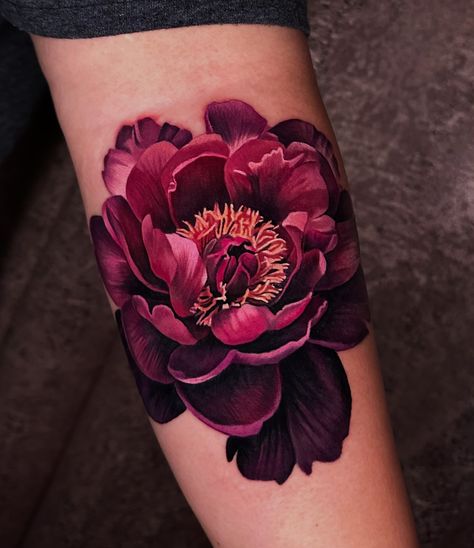 got to do this moody magenta peony for @phoenyx079 today as a start to a two day piece! we're doing another peony tomorrow and we were wondering if you could guess what color we will be doing tomorrow.... let us know in the comments!!!! . @obsidianmoontattoo . @fusion_ink @neumatattoomachines @inkmapstattooapp . #peony #peonytattoo #flowertattoo Floral Tattoo Design Peony, Dark Peonies Tattoo, Peony Tattoo With Name, Burgundy Flower Tattoo, Pink Black Tattoo, Colored Tattoo Sleeve Women, Colour Peony Tattoo, Peony Tattoo Cover Up, Colorful Peony Tattoo