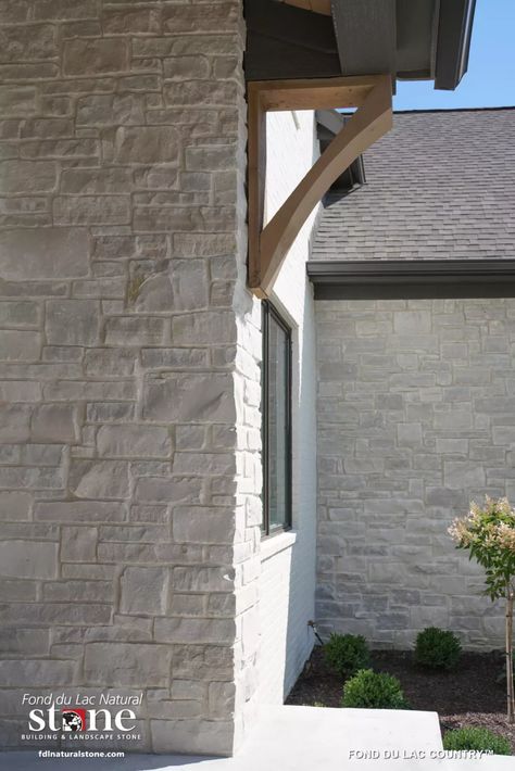 Light Stone Exterior House, Home Stone Exterior Ideas, Dutch Quality Stone Winter Point, Natural Stone Veneer Exterior, Boxwood Driveway, White Stone Exterior House, White Exterior Stone, Overgrouted Stone Exterior, Brick And Limestone Exterior