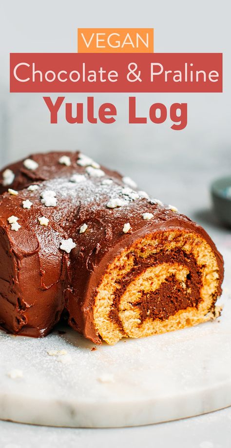 Tender and moist vegan yule log filled with a delicious chocolate praline filling! With notes of caramelized nuts and vanilla, this plant-based dessert is perfect for Christmas! #christmas #recipes #vegan #plantbased #veganbaking Vegan Yule Log, Dinner Feast, Vegan Christmas Desserts, Vegan Christmas Dinner, Chocolate Roll Cake, Baking Vegan, Yule Log Cake, Allergen Free Recipes, Cake Roll Recipes