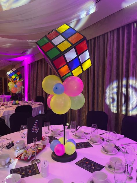 Rubik’s cube
80s party
table centrepieces 
neon balloons 90s Theme Party Table Decor, 80s Theme Table Centerpieces, 80s Party Table Centerpieces, 90s Table Decor, 90s Table Decorations, 80s Theme Centerpieces, 90's Theme Centerpieces, 80s Centerpieces Diy, 80s Table Decorations