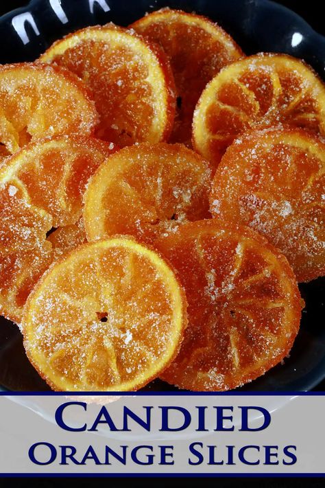 A blue plate with candied orange slices arranged on it. Edible Dried Orange Slices, Dehydrated Candied Orange Slices, Candy Orange Slices, Candied Orange Peel Recipe, Orange Peel Recipe, Candied Fruit Recipes, Sugared Fruit, Candied Citrus, Candied Orange Slices