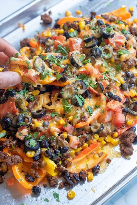 Replace those chips with a touch of sweetness! These Mini Sweet Pepper Nachos are the perfect way to use up some leftover taco meat (or go meat-free), and still indulge that nacho craving, but with a gluten-free, low-carb option! Sweet Pepper Nachos, Mini Peppers Recipes, Pepper Nachos, Corn Bean Salsa, Leftover Taco Meat, Vegetarian Nachos, Black Bean Corn, Mini Sweet Peppers, Stuffed Mini Peppers