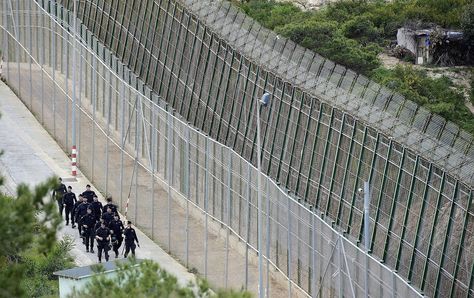 These 27 Photos Were Taken At The Border Of Different Countries. Some Are Downright Scary. Riot Police, West Berlin, Dragon Maid, Alien Planet, Refugee Camp, Great Wall Of China, Without Borders, Rural Area, Police Officers