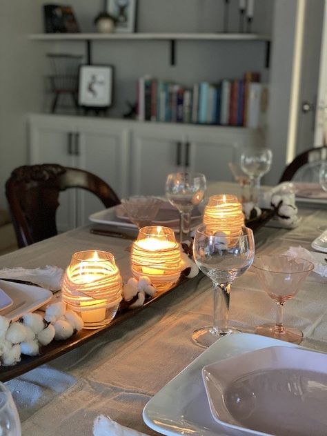 Do you have a narrow table? If so, finding a centerpiece that doesn't overpower the table can be a challenge. I found a simple DIY rustic votive that is a great way to decorate on a smaller table.To make these you don't need a lot of supplies. I used some stemless wine glasses, yarn and burlap twine. You could make them out of a clear glass jar too.For more easy DIY projects come visit Design Morsels. These only take a few minutes to make. The first step is to gather all the suppli… Steampunk Candle Holder, Table Leg Candle Holder, Tapper Candles, Simple Table Settings, Elegant Candle Holders, Log Candles, Concrete Candle Holders, Narrow Table, Diy Shades