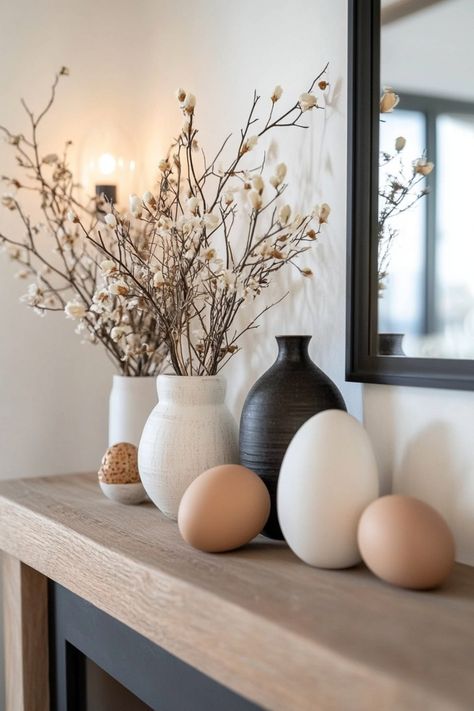 If you want to decorate your house for Easter but are on a strict budget, then try out some of these tips and decor ideas to create statement pieces in your home. Easter Decorations Aesthetic, Spring Decor Aesthetic, Easter Garland Ideas, Front Porch Easter Decor, Easter House Decor, Easter Decor Modern, Modern Spring Decor, Natural Easter Decor, Neutral Spring Decor