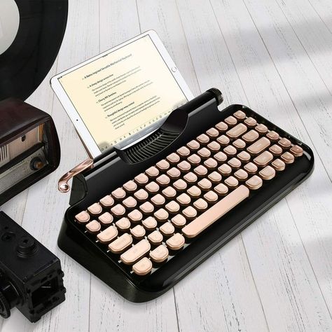 This gorgeous keyboard will give your desk a retro feel with all the modern comforts Magnetic Spice Tins, Future Gadgets, Retro Typewriter, Wireless Keyboard, Vintage Keys, Vintage Typewriters, Tablet Stand, Cable Wire, Label Printer