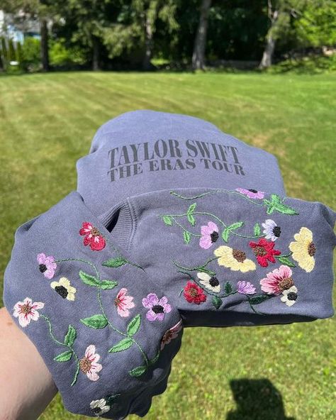 Elise on Instagram: "Slowly but surely making my way through my waitlist for custom hand embroidery on your Eras tour sweatshirts.   These have been a welcome distraction from the chaos of moving with two little kids 🤪 That’s one of the main reasons I always come back to hand-stitching. It’s a slow, patient process that helps me take my mind off the stressful stuff in life. I’ve always found that keeping my hands busy helps me keep my brain in check, too. Surely I’m not the only person out here who can listen better if my hands are busy and can process my thoughts better if my hands are occupied. If you relate, let me know!   🪡If you’d like a spot on my waitlist for some custom hand-embroidery the link is in my bio and I’ll share it to stories too.   🪡If you want to try stitching these Eras Tour Embroidery, I Always Come Back, Slowly But Surely, My Brain, My Thoughts, The Chaos, Eras Tour, My Way