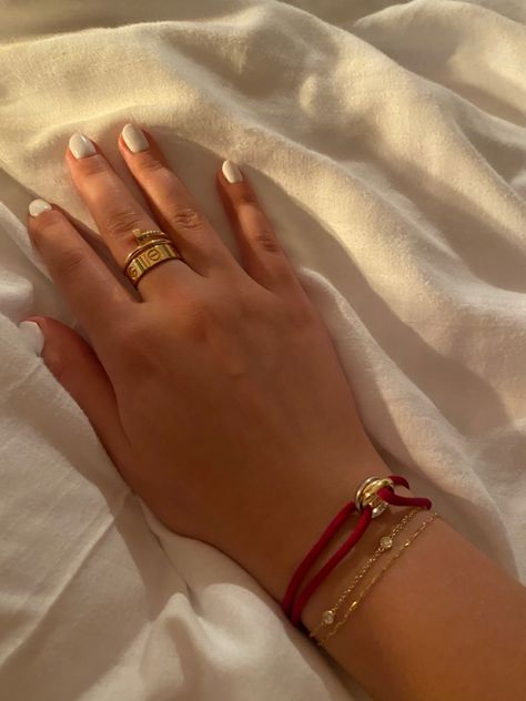 Cartier And Tiffany Bracelet Stack, Cartier Trinity Bracelet Cord Colors, Cartier Love Ring Gold, Cartier Love Ring Aesthetic, Love Cartier Ring, Cartier Bracelet And Ring, Cartier Trinity Bracelet Stack, Gold Cartier Ring, Cartier Stacked Bracelets