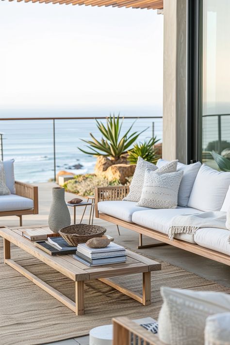 Explore 31 casual modern coastal garden decor ideas. Create a relaxed, beachy vibe with soft blues, sandy neutrals, and white accents. Incorporate natural materials like wicker, rattan, and driftwood. Use light, breezy fabrics, coastal-themed accessories, and nautical touches. Design a serene, inviting space that captures the essence of laid-back coastal living. Australian Decor, Serene Home, Bedroom Coastal, Sleek Coffee Table, Coastal Garden, Seaside Hotel, Modern Coastal Decor, Sophisticated Bedroom, Minimalist Sofa