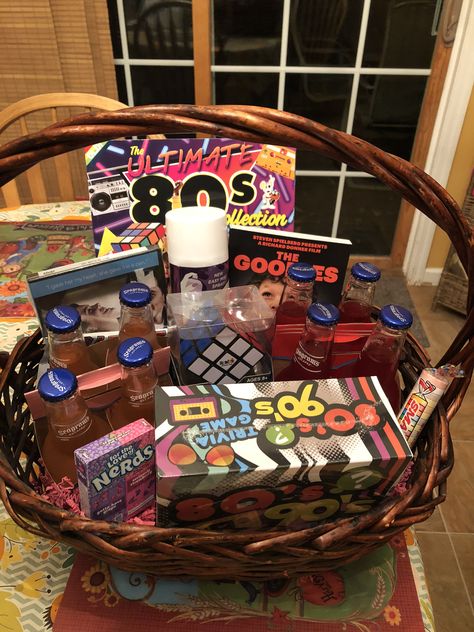 Includes Aqua Net, Say Anything DVD, Goonies DVD, Nerds, Bottle Caps, Big League Chew, Smarties, Pop Rocks, Rubics Cube, 80’s Ultimate Magazine, wine coolers!! 80s Gift Basket Ideas, 80s Gift, Big League Chew, Aqua Net, Wine Coolers, Goonies, Gift Basket Ideas, Bottle Caps, Basket Ideas