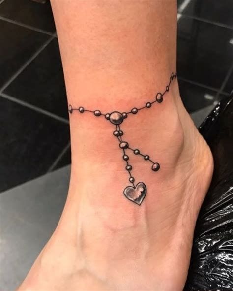 charm bracelet tattoo designs - Yahoo Search Results Ankle Tattoos For Women Anklet, Ankle Bracelets Tattoos For Women, Ankle Bracelet Tattoos, Charm Anklet Tattoo, Bracelet Tattoo Ideas, Anklet Tattoos For Women, Charm Bracelet Tattoo, Bracelet Tattoos, Wrist Bracelet Tattoo