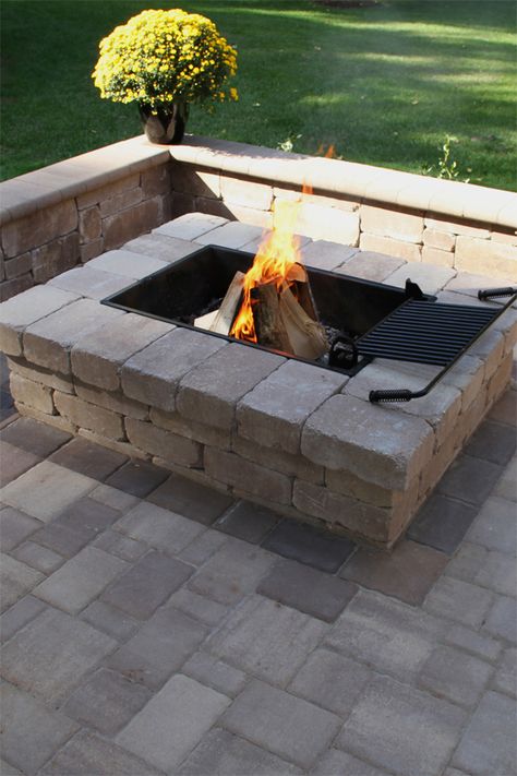 The Yorkshire™ Fire Pit comes in a tumbled finish, giving it a rustic look that matches up to most of NewLine Hardscapes' wall products. The size of this fire pit makes it an ideal place to sit around with family and friends. The Yorkshire Fire Pit is available in both a rectangle and square unit, and can be used either for wood-burning fires or fitted for natural gas. Landscaping Ideas For Backyard, Diy Fire Pit Ideas, Hardscape Ideas, Ideas For Backyard, Fire Pit Materials, Fire Pit Landscaping, Fire Pit Kit, Rectangular Fire Pit, Cool Fire Pits