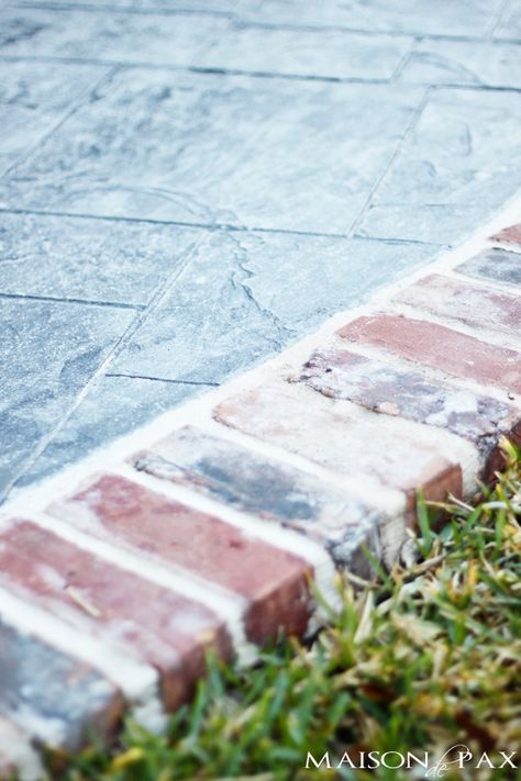 We used a blue/gray stamped concrete for the main portion of the porch and bordered it in an antique-looking brick. gorgeous stamped concrete and antique brick patio | maisondepax.com Back Porch Renovation, Antique Brick Patio, Porch Renovation, Big Leaf Plants, Back Porch Designs, Brick Border, Patio Edging, Brick Edging, Cement Patio