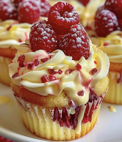 Light, fluffy cupcakes filled with fresh raspberries and a hint of lemon, topped with a zesty lemon cream frosting. Perfect for any occasion! Lemon And Raspberry Cupcakes, Bakery Food Ideas, Fruit Cupcakes Recipes, Aesthetic Dates, Decadent Cupcakes, Cupcakes Aesthetic, Gourmet Cupcake Recipes, Lemon Heaven, Trending Desserts