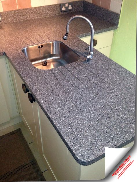 Gray Granite worktops with under-mounted sink and angled drainer grooves Kitchen Platform Granite, Kitchen Cabinet Lighting Ideas, Cabinet Lighting Ideas, Kitchen Cabinet Lighting, Kitchen Platform, Granite Countertops Colors, Granite Worktops, Gray Granite, Granite Countertops Kitchen