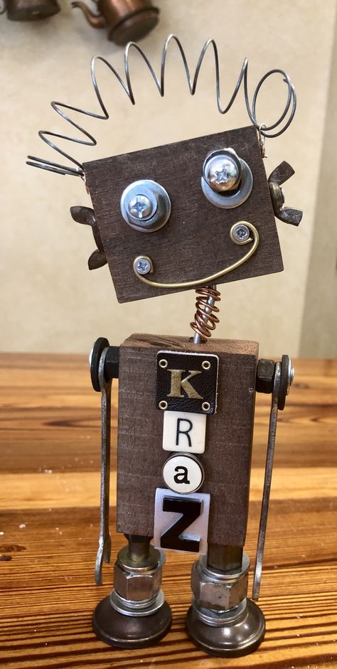 Junkbot Ideas, Kids Carpentry, Wood Robots, Metal Robots Junk Art, Scrap Wood Robots, Junk Bots Robots, Found Object Robot, Creepy Baby Dolls, Robot Craft