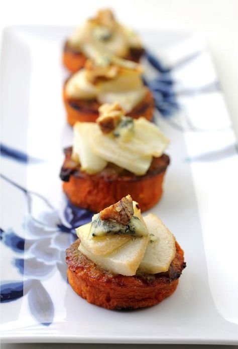 12 Scrumptious Appetizers to Kick Off Your Thanksgiving Celebration via Brit + Co. Yam Appetizers, Sweet Potato Appetizers, Potato Appetizer, Pear Blue Cheese, Appetizers Vegetarian, Roasted Yams, Appetizers Thanksgiving, One Bite Appetizers, Potato Appetizers