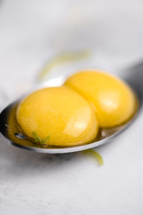 These impressive molecular mango spheres are sure to be a hit at your next party! Dress them up on the serving spoons or put on top of your favorite dessert. Gastronomy Recipes, Molecular Gastronomy Recipes, Caviar Recipes, Bakery Ideas, Modern Food, Fine Dining Recipes, Mango Recipes, Molecular Gastronomy, Favorite Dessert