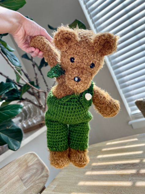 A two-step pattern to create an adorable teddy bear with a green overall and missing button for the children’s book, Corduroy by Don Freeman. Corduroy, a bear who lived in the toy department of a big store, and the girl who took him home. Crochet Teddy Bear Overalls, Crochet Corduroy Bear, Corduroy The Bear, Corduroy Book, Crochet Pattern Teddy Bear, Overalls Corduroy, Corduroy Bear, Teddy Bear Crochet Pattern, Pattern Teddy Bear