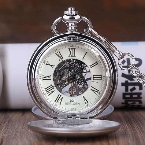 Close-up of a Brelsen Royal Silver Double Hunter Mechanical Pocket Watch with a white face, Roman numerals, and intricate mechanical details. Skeleton Pocket Watch, Skeleton Face, Mechanical Pocket Watch, Silver Pocket Watch, Mechanical Hand, Pocket Watch Antique, Mens Anniversary Gifts, Pocket Watches, Beautiful Watches