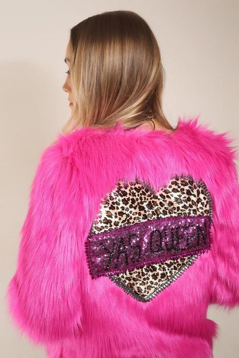 - Threaded Tribe -  ♡ LIMITED EDITION ♡Fuchsia hot pink faux fur jacket. Hip/Waist length. Casual snug fit!Large leopard print heart on back bordered with black/silver kitschy trim. Hand embellished black sequinned "Yas Queen" lettering on back.  The perfect jacket to make a statement. Wear at a party, festival, or day to day. Keep cosy and warm this winter in style.Note: Garment CareDue to the delicate nature of the garment please HAND WASH in cool water.Medium Heat for Ironing.♡ Thank you so m Pink Faux Fur Jacket, Sass Queen, Yas Queen, Black Jewel, Pink Faux Fur, Sequin Jacket, Faux Fur Jacket, Black Sequins, Fur Jacket