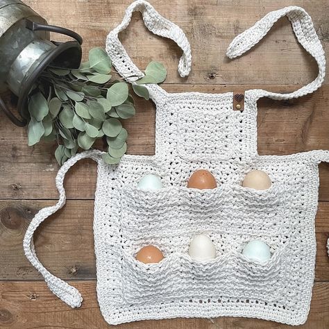 🥚🥚🥚 Charlie’s Egg Apron. A cotton crochet apron perfect for little ones who love gathering fresh eggs from the coop #CrochetLove #EggApron #FarmLife #HandmadeWithLove #CrochetCreations #EggGathering #CraftyLiving #YarnLife #SustainableStyle #KozyKomforts #HomesteadLiving #Charlie’sEggApron Crochet Egg Apron Free Pattern, Crochet Egg Apron, Apron Crochet, Crochet Apron, Egg Apron, Crochet Egg, Egg Aprons, Crochet Wear, Apron Pattern