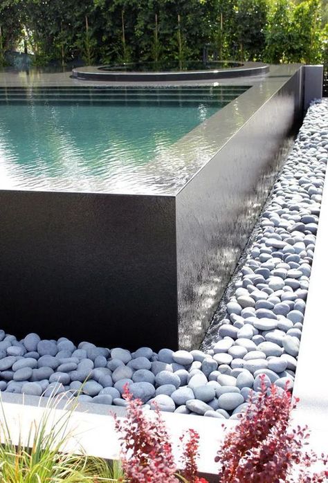 raised pool pebbles Infinity Pool Backyard, Raised Pools, Terrace Building, Architecture Contemporary, Above Ground Pools, Tropical Backyard, Round Pool, Mediterranean Landscaping, Ground Pools